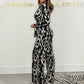 Langermet leopard-sebra jumpsuit med V-hals og lange ermer