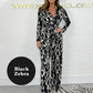 Langermet leopard-sebra jumpsuit med V-hals og lange ermer