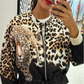 Glidelåsjakke med leopardmønster