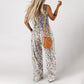✨ 50 % RABATT NÅ! 🌼 Blomstret, ermeløs jumpsuit for damer – smocket brystparti og vide ben – sommerlig chic 👒�