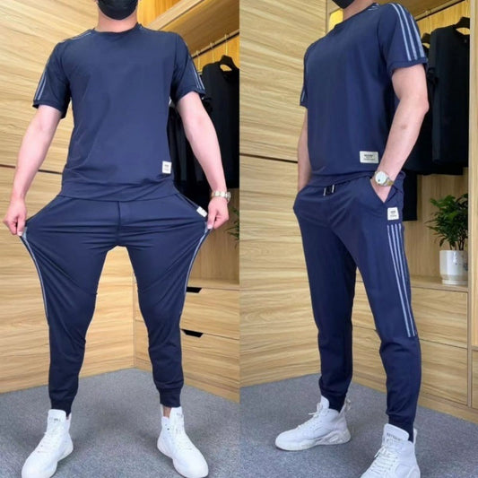 2-delt sett med kortermet topp og joggebukse med høy stretch for menn