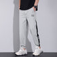 Trendy joggers med lommer i is-silke for menn