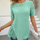 Damebluse med blomstertopp og korte ermer