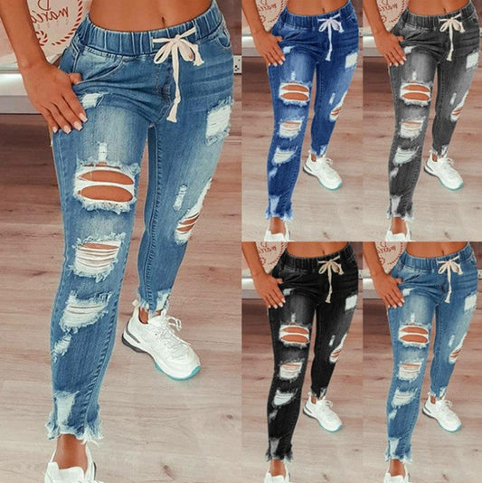 Skinny stretchjeans med rifter til dame