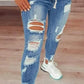 Skinny stretchjeans med rifter til dame