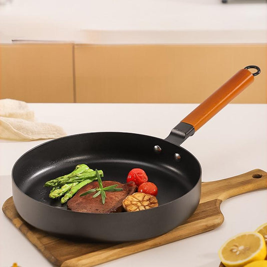 Rustfri stekepanne med nonstick-belegg