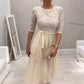 Elegant midi-kjole med blonderhals og mesh