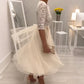 Elegant midi-kjole med blonderhals og mesh