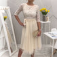 Elegant midi-kjole med blonderhals og mesh