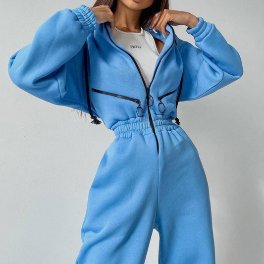 Komfortabel ensfarget jumpsuit med hette for kvinner