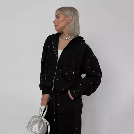 2-delers sett med polka dot-hettegenser med glidelås og bukser for kvinner