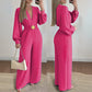 Elegant jumpsuit med V-hals, vide ben og belte