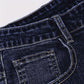 Herrejeans i rett passform med slitt look