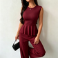 To-delt sett med ermeløs peplum-top og bukser for damer