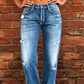 👖 50 % RABATT NÅ! 🔥 Slim fit-jeans med utvidet ben i slitt look for damer – Elastisk denim og vintage-look – Slitte detaljer, flatterende passform – perfekt til avslappede dager eller en rå street-stil ✨