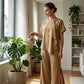 ✨ Asymmetrisk topp og bukser med vide ben og spalte – Et elegant blikkfang