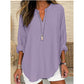 Casual ensfarget bluse med V-hals for kvinner