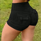 Sportshorts for kvinner med formende effekt på baken – trenings-, yoga- og cargobukser