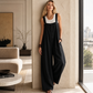 Jumpsuit for kvinner i fritidsstil med brede stropper og knapper