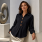 Elegant damebluse med reverskrage og knapper