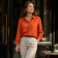 Elegant damebluse med reverskrage og knapper