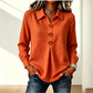 Elegant damebluse med reverskrage og knapper