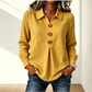 Elegant damebluse med reverskrage og knapper