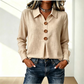 Elegant damebluse med reverskrage og knapper
