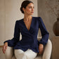 Peplum-bluse med V-hals og lanterneermer for damer