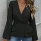 Peplum-bluse med V-hals og lanterneermer for damer