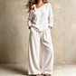 Sett med off-shoulder-topp og vide bukser for kvinner