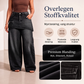 Dameskjørt i lag over denimjeans