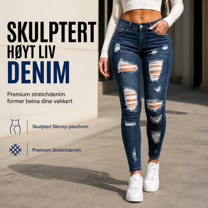 Dame høyvist, revne skinny-jeans, slitt og strekkbar denim-bukser