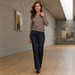 Elegant ribbestrikket topp for kvinner med metallspenne
