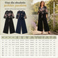 Eleganblomstret Jumpsuit med V-utringning, Vidbeinte Bukser, Midjebånd og Kruslete 3/4-ermer