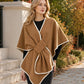 Elegant strikket poncho-sjal for kvinner